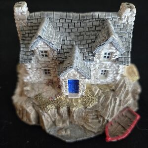 Charming Stone Cottage Figurine with Blue Door